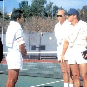 TAKING CARE OF BUSINESS, Mako (second from left), right left to right: Thom sharp, Jim Belushi, John de Lancie, 1990, © Buena Vista