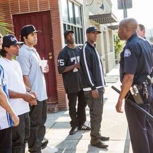 STRAIGHT OUTTA COMPTON, from left, excluding police: Neil Brown Jr., as Dj Yella, Jason Mitchell, as Eazy-E, O'Shea Jackson Jr., as Ice Cube, Aldis Hodge, as MC Ren, Corey Hawkins, as Dr. Dre, 2015. ph: Jamie Trueblood/©Universal Pictures