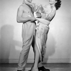 THE BROTHERS RICO, from left: Richard Conte, Dianne Foster, 1957