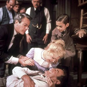 A BIG HAND FOR THE LITTLE LADY, foreground: Kevin McCarthy (left), Joanne Woodward (top), Henry Fonda (on ground), Jean-Michel Michenaud (right), background: John Qualen (watch chain), 1966
