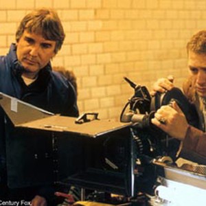 Director of Photography THIERRY ARBOGASTON, left, and Director CHRIS NAHON are on the set of KISS OF THE DRAGON. photo 6