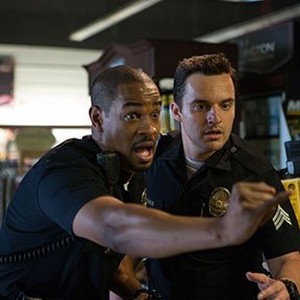 (L-R) Damon Wayans Jr. as Justin and Jake Johnson as Ryan in "Let's Be Cops."