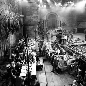 THE ADVENTURES OF ROBIN HOOD, Basil Rathbone, Claude Rains, Errol Flynn, director Michael Curtiz and many others on set, 1938