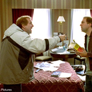 Twin-brothers Donald, left, and Charlie Kaufman (both played by Nicolas Cage) travel across the country in their attempt to unlock the mysteries of The Orchid Thief.