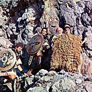 JASON AND THE ARGONAUTS, Todd Armstrong (as Jason), Gary Raymond (as Acastus), Laurence Naismith (as Argus), Nancy Kovack (as Medea), holding the Golden Fleece, 1963.