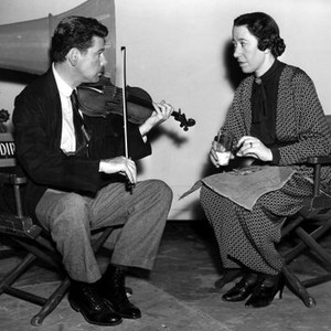 WE ARE NOT ALONE, Paul Muni, Flora Robson, on set,  1939
