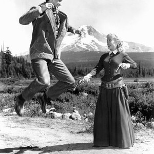 BEND OF THE RIVER, rock Hudson, Lori Nelson fooling around on location in Oregon, 1952