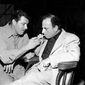 A LADY WITHOUT PASSPORT, Actor James Craig and Director Joseph H. Lewis between scenes. 1950