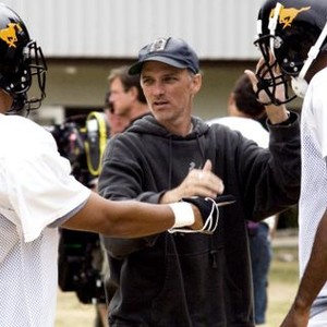 GRIDIRON GANG, Director Phil Joanou (center), on set, 2006. ©Columbia Pictures