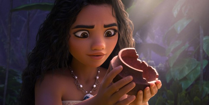 Moana (voiced by Auli’i Cravalho) finding clues, in "Moana 2." (Walt Disney Animation Studios)