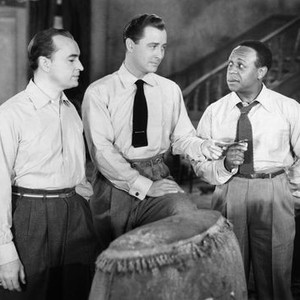 WHAT'S BUZZIN', COUSIN?, from left: Freddy Martin, John Hubbard, Eddie 'Rochester' Anderson, 1943