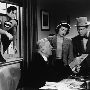 SUPERMAN, from left: Kirk Alyn, Pierre Watkin (seated), Noel Neill, Tommy Bond, 1948