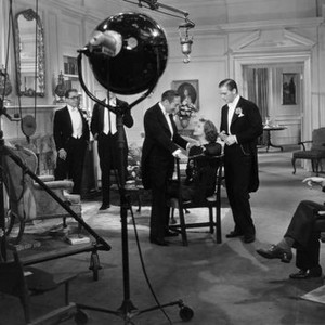 MORNING GLORY, from left: Fred Santley, C. Aubrey Smith, Adolphe Menjou, Katharine Hepburn, Douglas Fairbanks Jr. director Lowell Sherman (seated right) filming on set, 1933