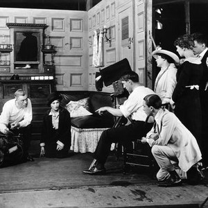 THE HOODLUM, Mary Pickford (second from left), director Sidney Franklin (pointing), on set, 1919