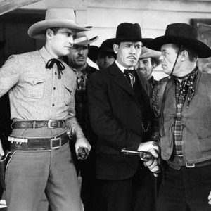TWO-FISTED RANGERS, front from left: Charles Starrett, Kenneth MacDonald, Dick Curtis, 1939