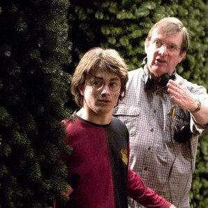 HARRY POTTER AND THE GOBLET OF FIRE, Daniel Radcliffe, director Mike Newell on set, 2005, (c) Warner Brothers