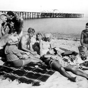 DRAGSTRIP RIOT, Carolyn Mitchell (center, leaning against beach ball), 1958