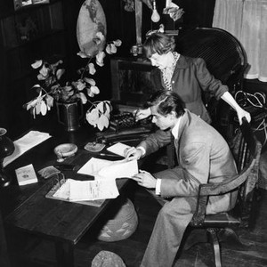 THE ADVENTURES OF MARTIN EDEN, Charmain London (standing), the widow of author Jack London shows Glenn Ford the original manuscript of 'The Sea Wolf,' 1942