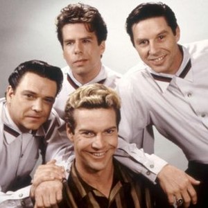 GREAT BALLS OF FIRE, Jimmie Vaughan as Roland James, Mojo Nixon (above) as James Van Eaton, Dennis Quaid as Jerry Lee Lewis, John Doe as J.W. Brown, 1989. ©Orion Pictures