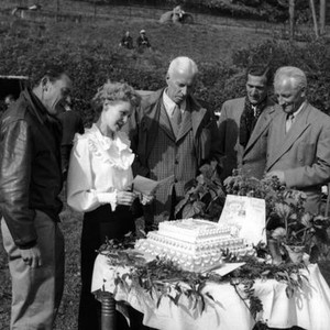 I WAS A MALE WAR BRIDE, director Howard Hawks, (center), on location in Germany, 1949, TM and Copyright © 20th Century Fox Film Corp. All rights reserved.