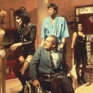 THE ROCKY HORROR PICTURE SHOW, Susan Sarandon, Tim Curry, Jonathan Adams (in wheelchair), Barry Bostwick, Patricia Quinn, 1975. TM & Copyright ©20th Century Fox. All rights reserved.