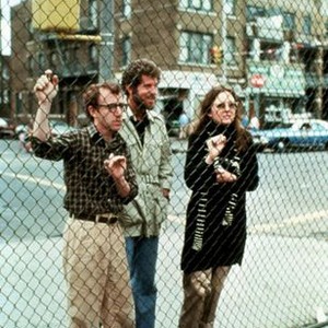 ANNIE HALL, Woody Allen, Tony Roberts, Diane Keaton, 1977, looking through wire fence