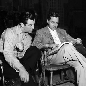 JOHNNY EAGER, Robert Taylor, director Mervyn LeRoy on set, 1942