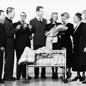 EVERYBODY'S BABY, from left, George Ernest, Kenneth Howell, Jed Prouty, Russell Gleason, Shirley Deane, Spring Byington, Florence Roberts, June Carlson, 1939, TM & Copyright ©20th Century Fox Film Corp