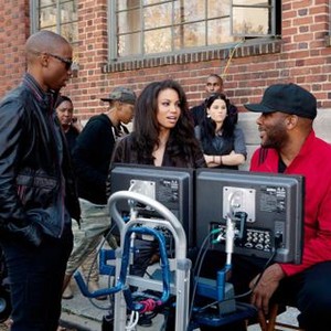 TYLER PERRY'S TEMPTATION, (aka TYLER PERRY'S TEMPTATION: CONFESSIONS OF A MARRIAGE COUNSELOR), from left: Robbie Jones, Jurnee Smollett-Bell, director Tyler Perry, on set, 2013. ph: KC Bailey/©Lionsgate