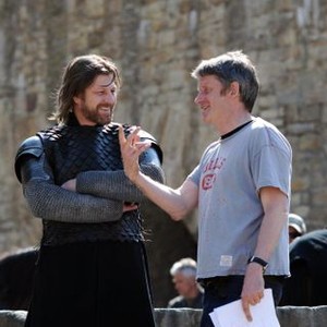 BLACK DEATH, from left: Sean Bean, director Christopher Smith, on set, 2010. ph: Stephanie Kulbach/©Magnet Releasing