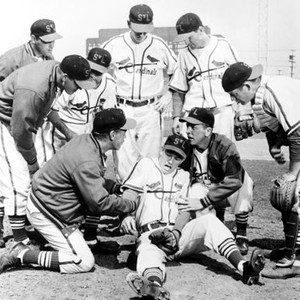 THE PRIDE OF ST.LOUIS, Richard Crenna, Dan Dailey, (on the ground), with members of the St.Louis Cardinals baseball team, 1952. TM& Copyright(c)20th Century Fox Film Corp. All rights reserved.
