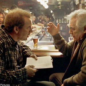 Charlie Kaufman (Nicolas Cage, left) corners screenwriting guru Robert McKee (Brian Cox) in Columbia Pictures' unconventional comedy Adaptation.