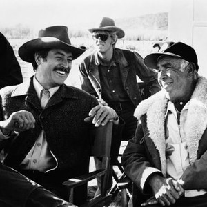 SHOWDOWN, from left, front, Rock Hudson, producer/director George Seaton, on-set, 1973