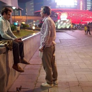 HER, from left: Joaquin Phoenix, director Spike Jonze, on set, 2013. ph: Sam Zhu/©Warner Bros. Pictures