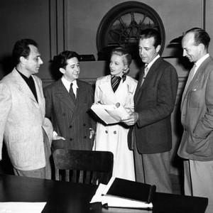 TO THE ENDS OF THE EARTH, aka THE TWENTY-SEVENTH DAY,  Producer Sidney Buchman, writer Jay Richard Kennedy, Signe Hasso, Dick Powell, and director Robert Stevenson, going over script, 1948