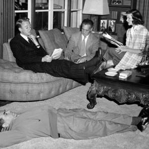 STATE OF THE UNION, director Frank Capra rests while Van Johnson, dialogue director Harold Winston, Katharine Hepburn, rehearse, 1948