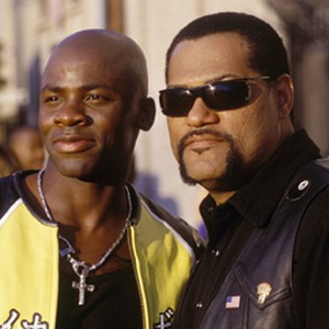 The young motorcycle racing prodigy Kid (DEREK LUKE, left) is determined to win the title King of Cali from Smoke (LAURENCE FISHBURNE) in DreamWorks Pictures' actioner BIKER BOYZ. photo 8