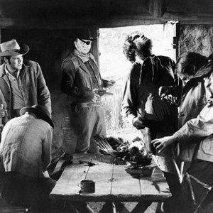 TRUE GRIT, Glen Campbell (back left), John Wayne (with eye patch), 1969