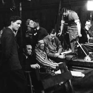 IN WHICH WE SERVE, seated, center, from left: co-director David Lean, co-director/star Noel Coward, cinematographer Ronald Neame, on set, 1942 inwhichweserve-fsct05(inwhichweserve-fsct05)