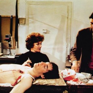 PERMISSION TO KILL, Timothy Dalton (lying down), Dirk Bogarde (right), 1975