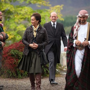 (L-R) Kristin Scott Thomas as Patricia Maxwell, Hamish Gray as Malcolm and Amr Waked as Sheikh in "Salmon Fishing in the Yemen."