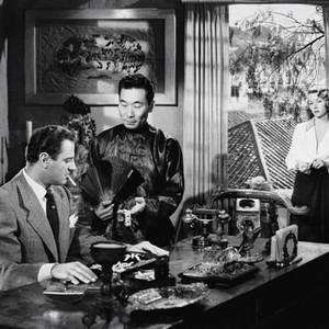 MACAO, from left: Brad Dexter, Philip Ahn, Gloria Grahame, 1952