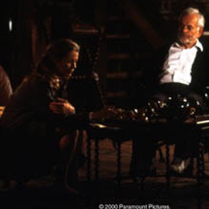 (L-R) Kim Basinger as Maggie O'Connor and Ian Holm as Reverend Grissom in "Bless the Child." photo 4