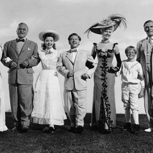 SUMMER HOLIDAY, from left, Agnes Moorehead, Frank Morgan, Gloria DeHaven, Mickey Rooney, Marilyn Maxwell, Jackie 'Butch' Jenkins, Walter Huston, 1948