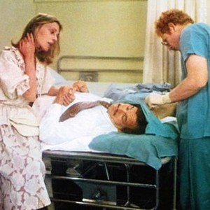 A PERFECT COUPLE, Marta Heflin (left), Paul Dooley (lying down), 1979, TM & © 20th Century Fox Film Corp.