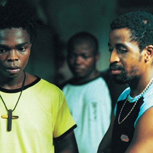Siyabonga Melongisi Shibe as James (left) and Hugh Masebenza as Skomboze photo 3