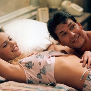 Charlize Theron and Patrick Swayze in Waking Up In Reno.