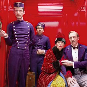 THE GRAND BUDAPEST HOTEL, from left: Paul Schlase, Tony Revolori, Tilda Swinton, Ralph Fiennes, 2014. ph: Martin Scali/TM and Copyright ©Fox Searchlight Pictures