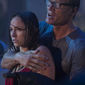 Dolph Lundgren as Andy Spector and Briana Evigan as Emma Nash in "Stash House." photo 20