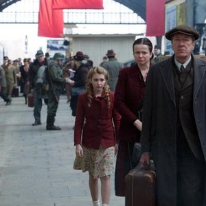 THE BOOK THIEF, from left: Sophie Nelisse, Emily Watson, Geoffrey Rush, 2013. ph: Jules Heath/TM and ©copyright Fox 2000. All rights reserved.